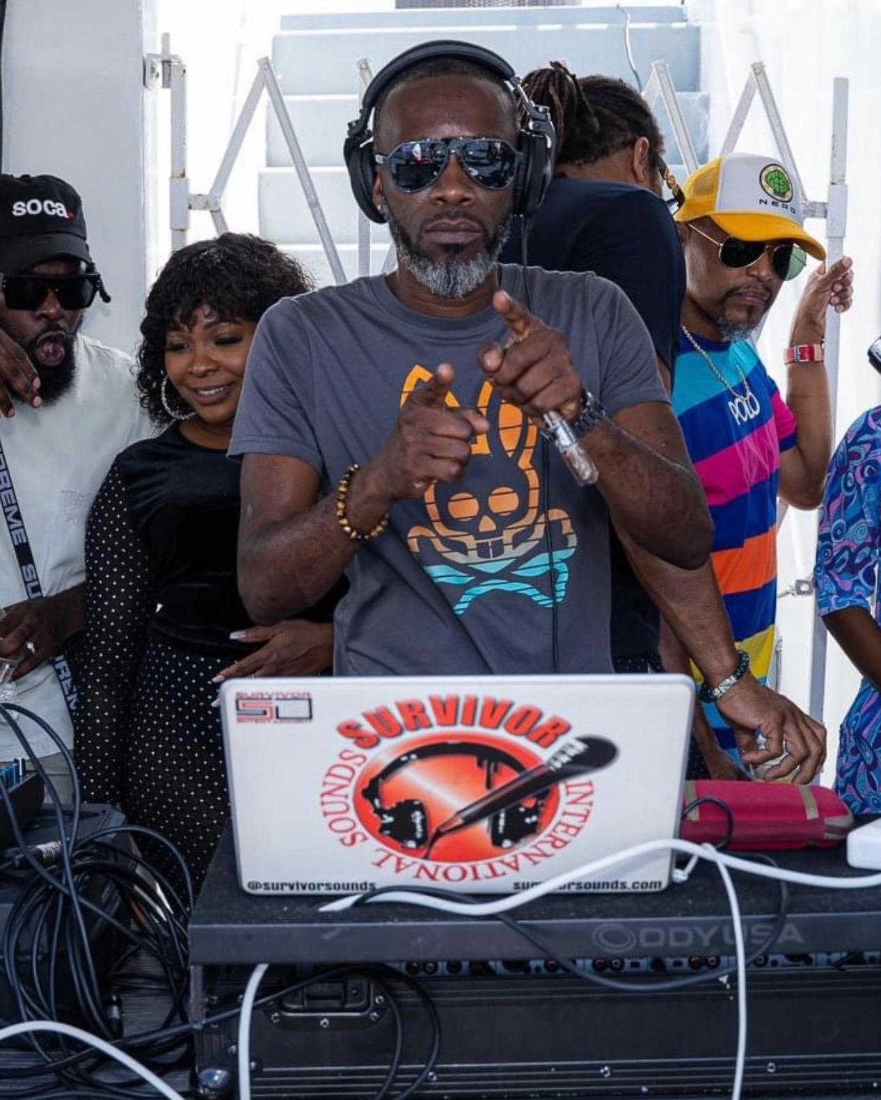 SURVIVORSOUNDS performing at an outdoor event